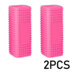 Duas escovas rosas. Escovas retangulares para remover pelos, com centro vazado.